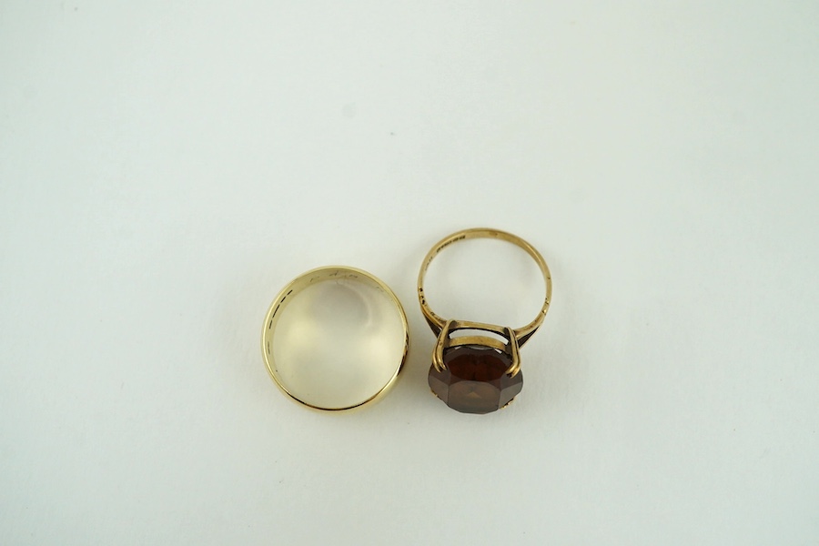 A 1970's 9ct gold wedding band and a 9ct gold and gem set rings, gross weight 9.2 grams. Condition - poor to fair